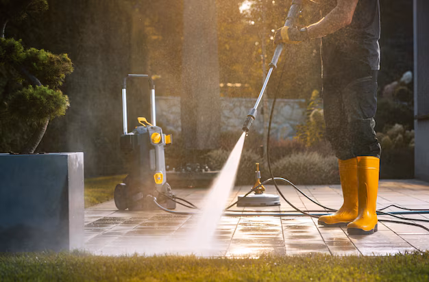 person-power-washing-patio-with-pressure-washer-sunny-outdoor-setting_1426-25891